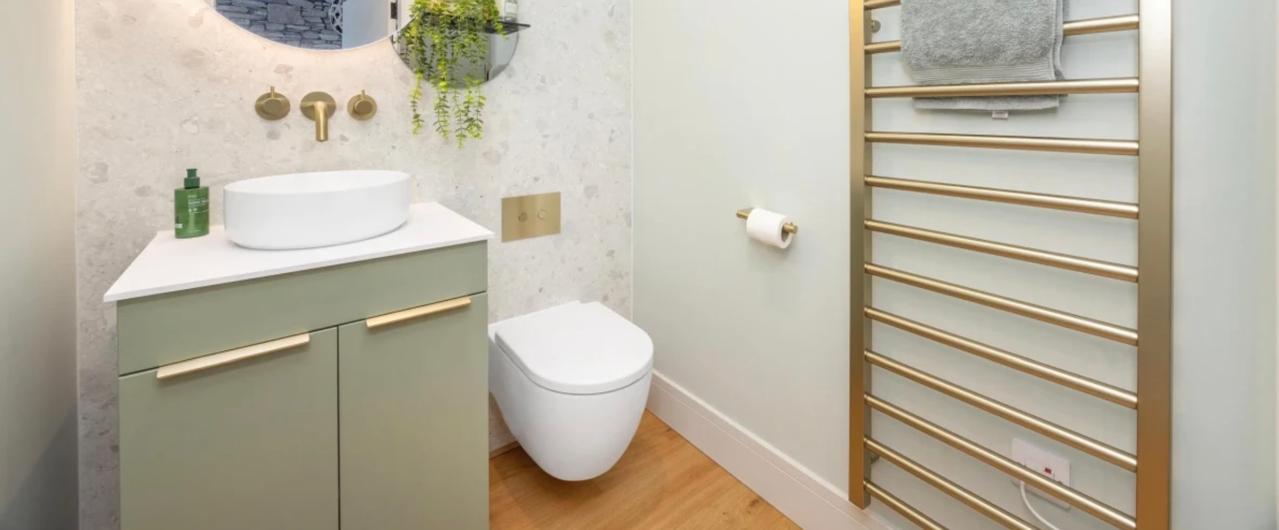 Sage green powder room